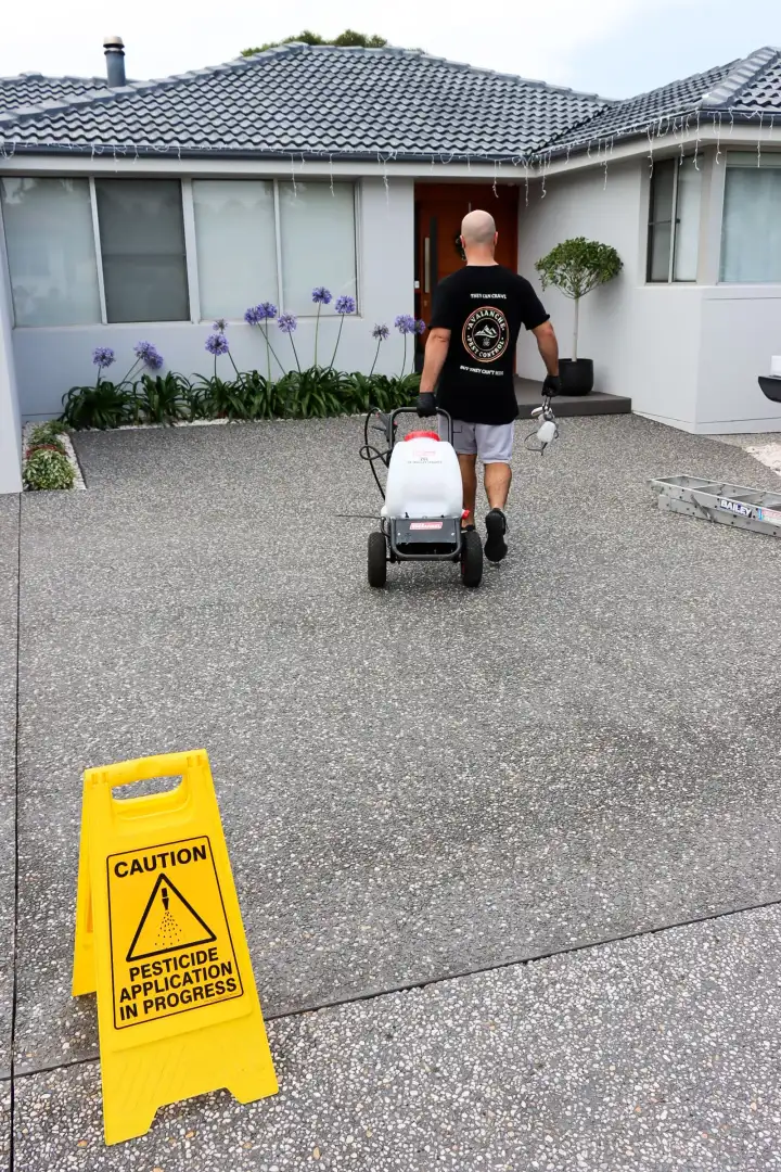 Pesticide application in progress at a Wollongong property